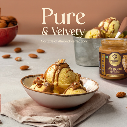 Almond nut butter jar near pastry pieces topped with nut butter
