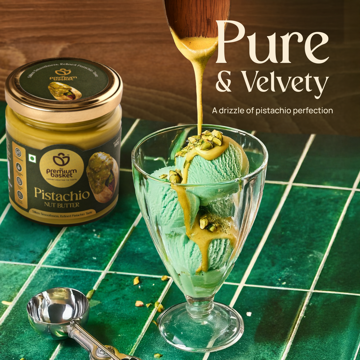 Pistachio nut butter jar beside glass dessert topped with pistachio spread