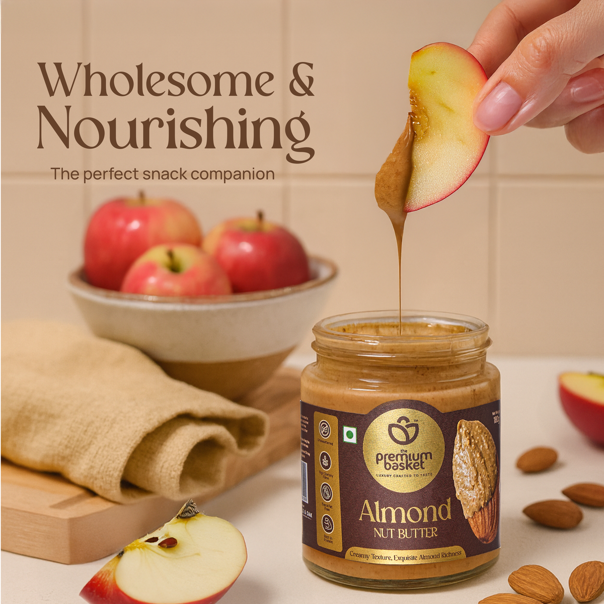 Almond nut butter jar with apple slice dripping nut butter
