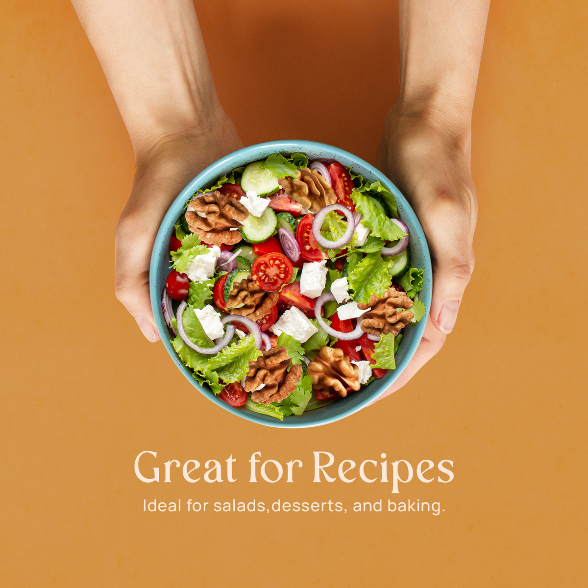 Salad bowl with chopped chile walnuts held by two hands