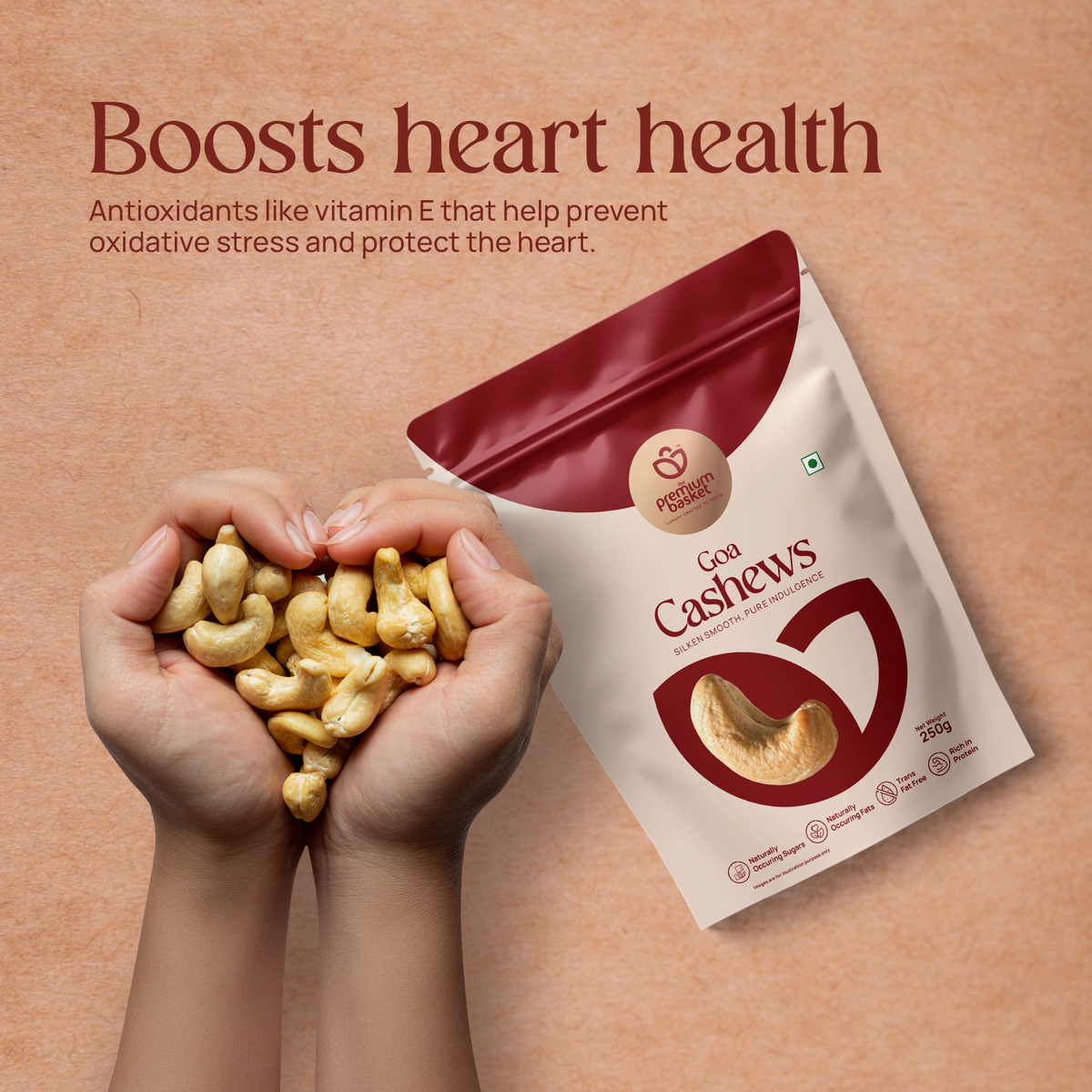 Goa Cashews pouch next to a handful of cashew nuts
