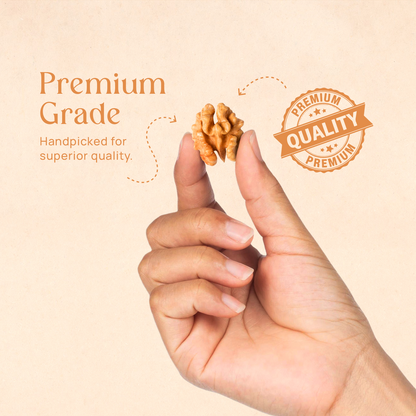 Hands holding chile walnut pieces