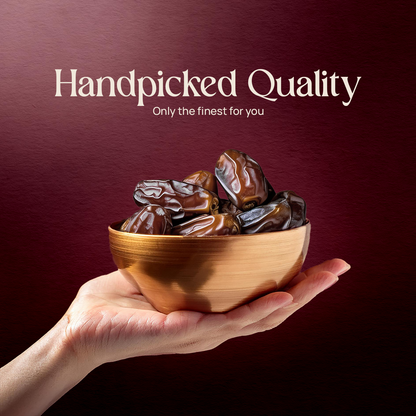 Hand holding bowl of Medjool dates, dark glossy pieces