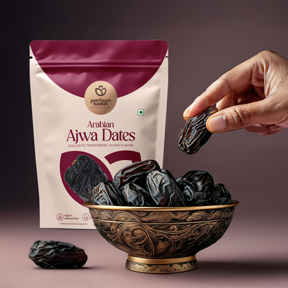 Ajwa dates pouch with hand holding a dark date above an ornate serving bowl