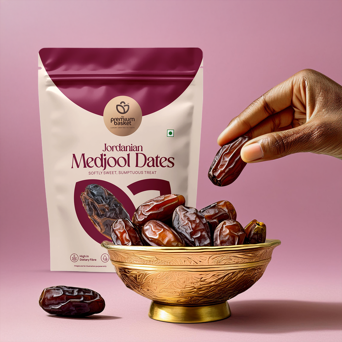 Jordanian Medjool dates pouch with bowl of dark dates and hand holding one
