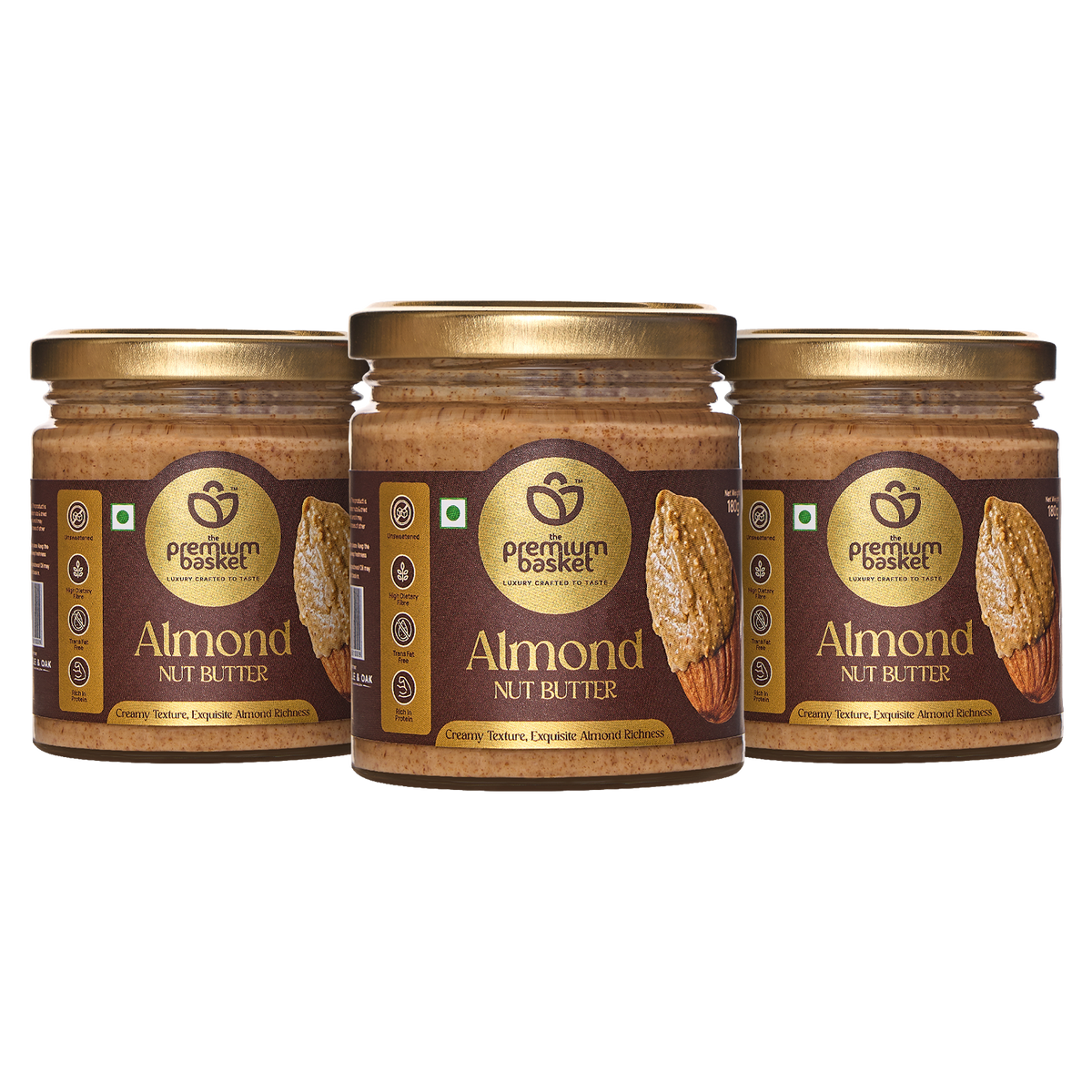 Three almond nut butter jars with gold lids