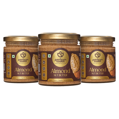 Three almond nut butter jars with gold lids