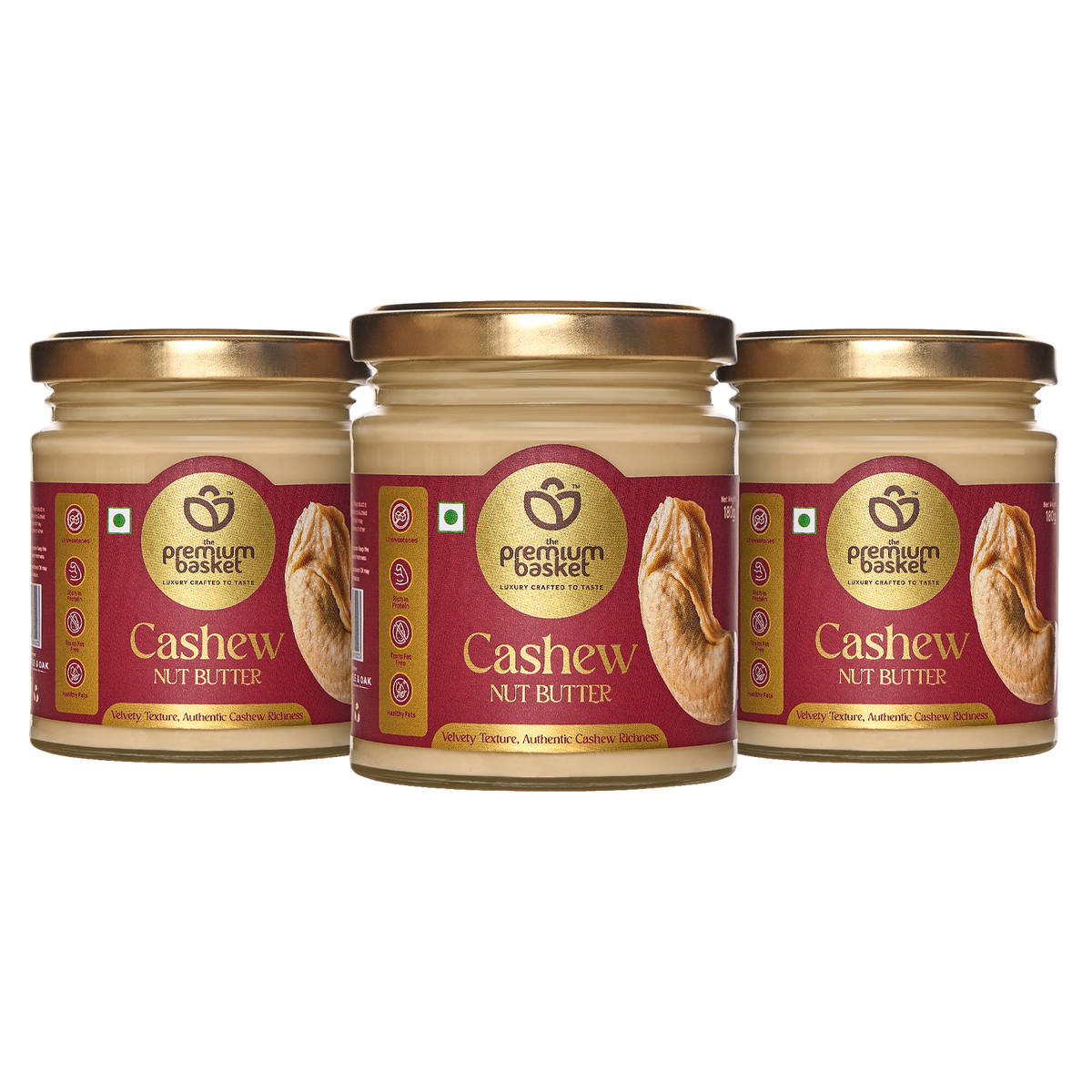 Three cashew nut butter jars with gold lids lined up
