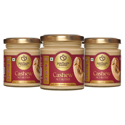 Three cashew nut butter jars with gold lids lined up