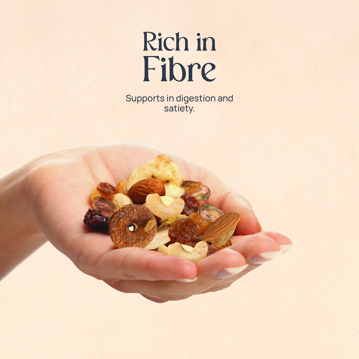 Hand holding mixed nuts, close-up handful
