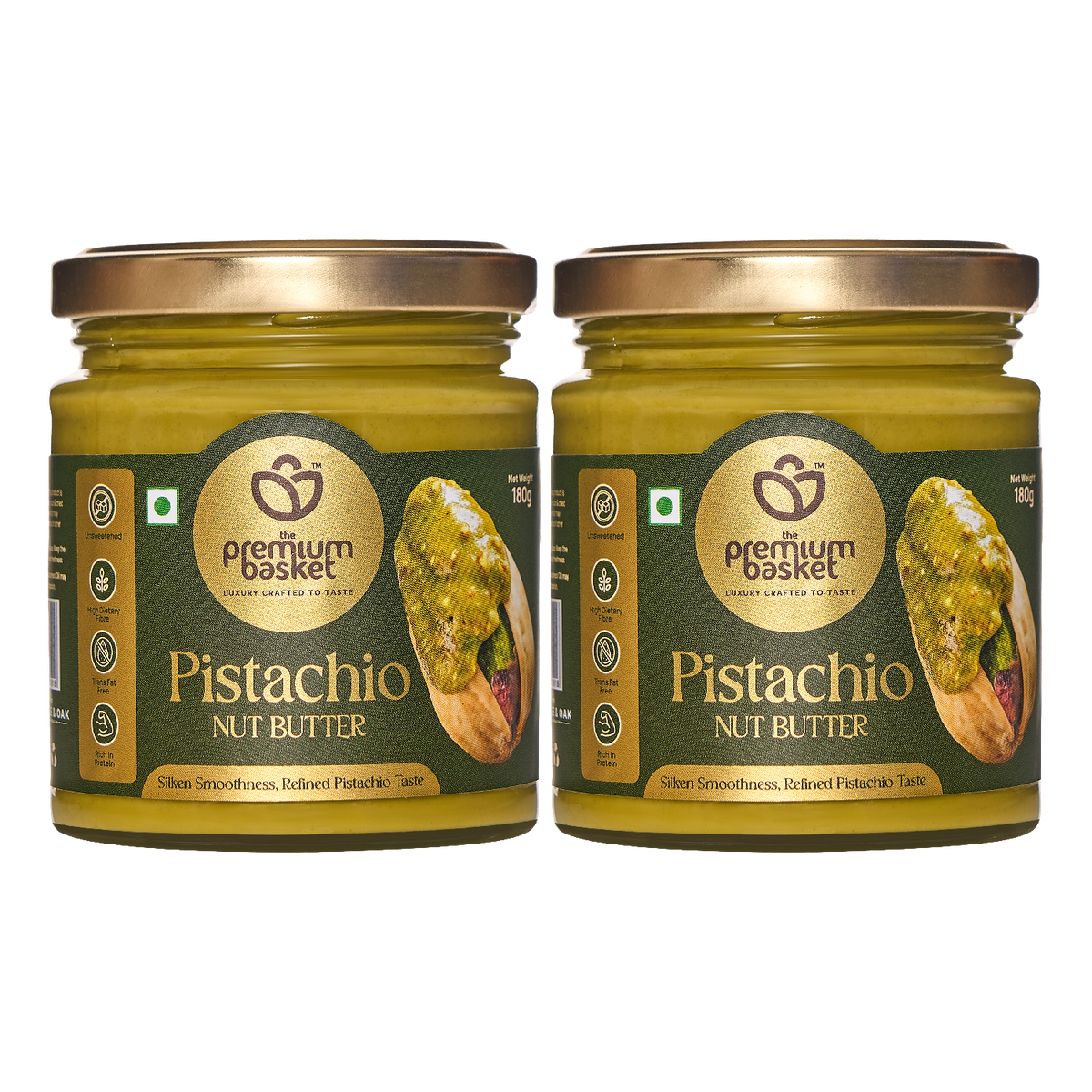 Two pistachio nut butter jars with green glass and gold lids, front labels